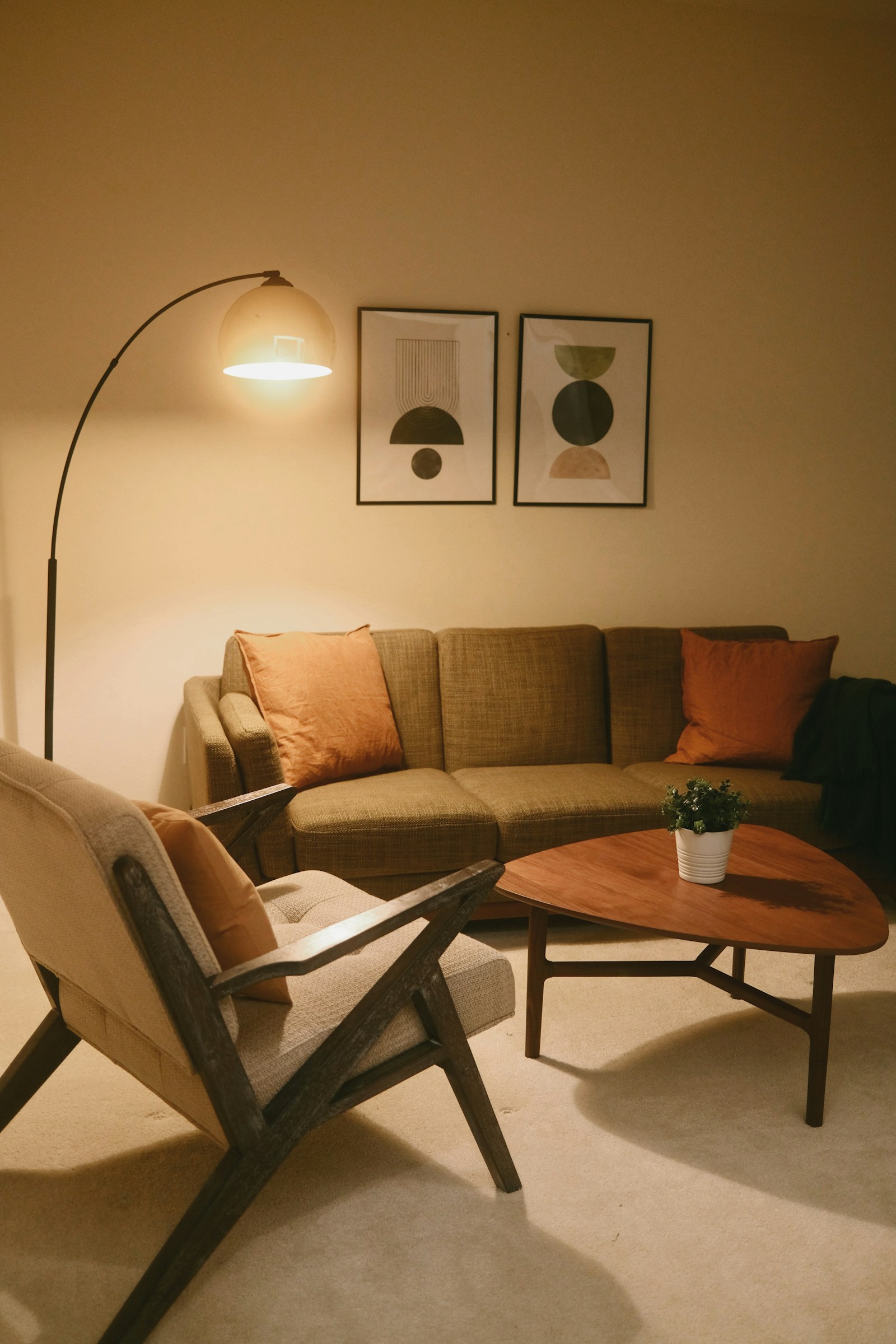 A warm lamp-lit lounge in the evening